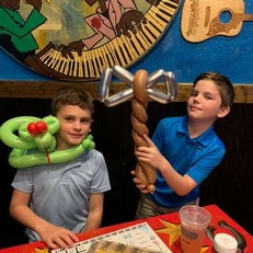 2 boys axe and snake.jpg